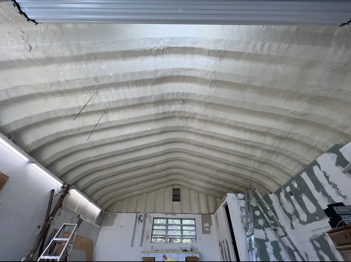 Spray polyurethane foam applied to the underside of a metal roof deck in Pryor Creek
